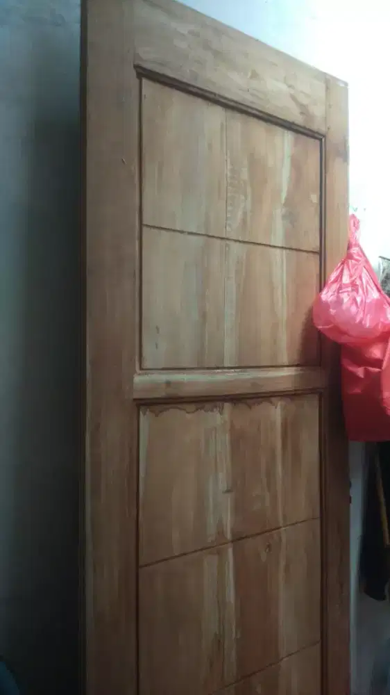 Daun pintu baru dan bekas