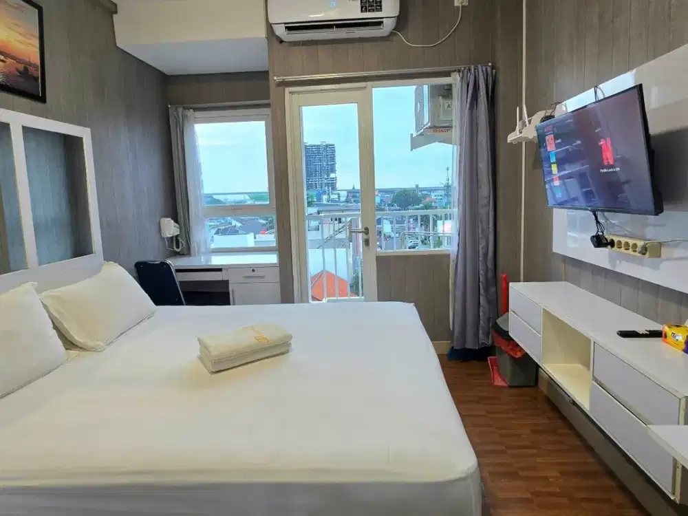 Apartemen Studio Grand Icon Caman Hadap Jalan St LRT Cikunir 1