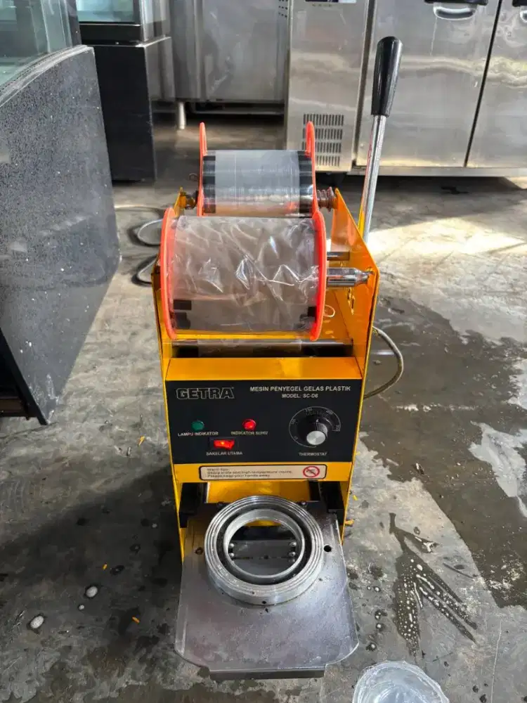 Getra mesin penyegel gelas plastik