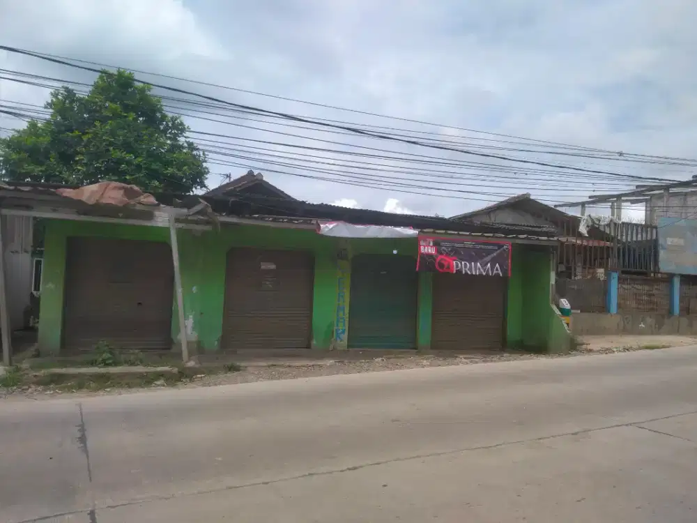 Di Jual Rumah + Toko 4 unit