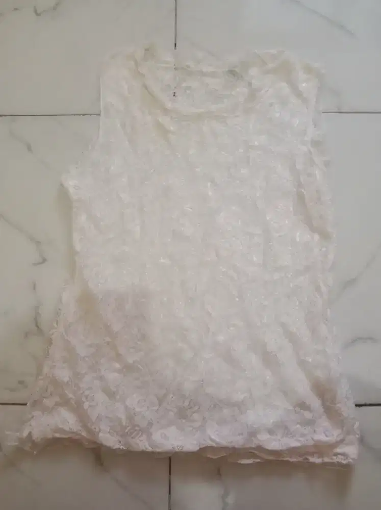 Atasan kutung wanita