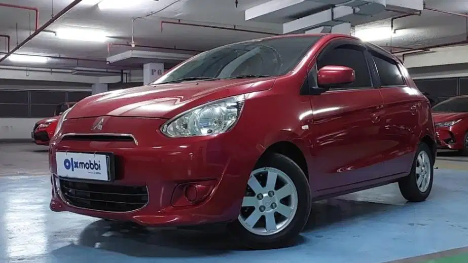 TDP 5,JT Mitsubishi Mirage 1.2 SPORT Bensin-AT Merah 2015