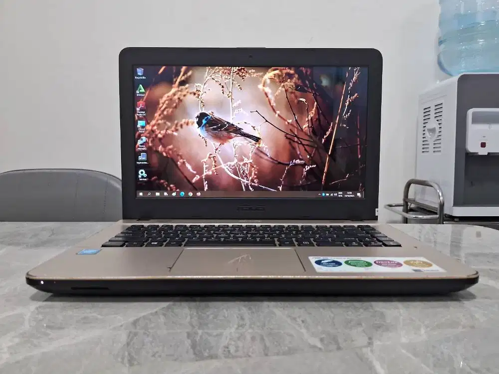 NETT Laptop ASUS 4GB Win ORI SSD +HD ReadyUp Sound AJIB Mulus Garansi