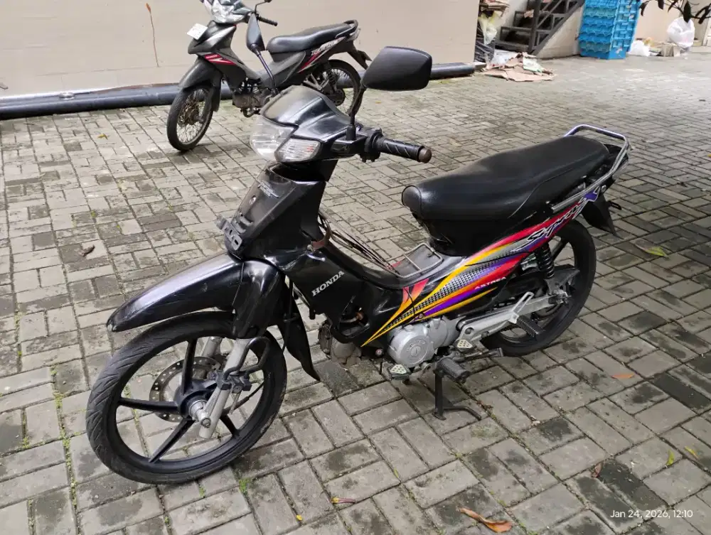 Supra X 100 tahun 2002