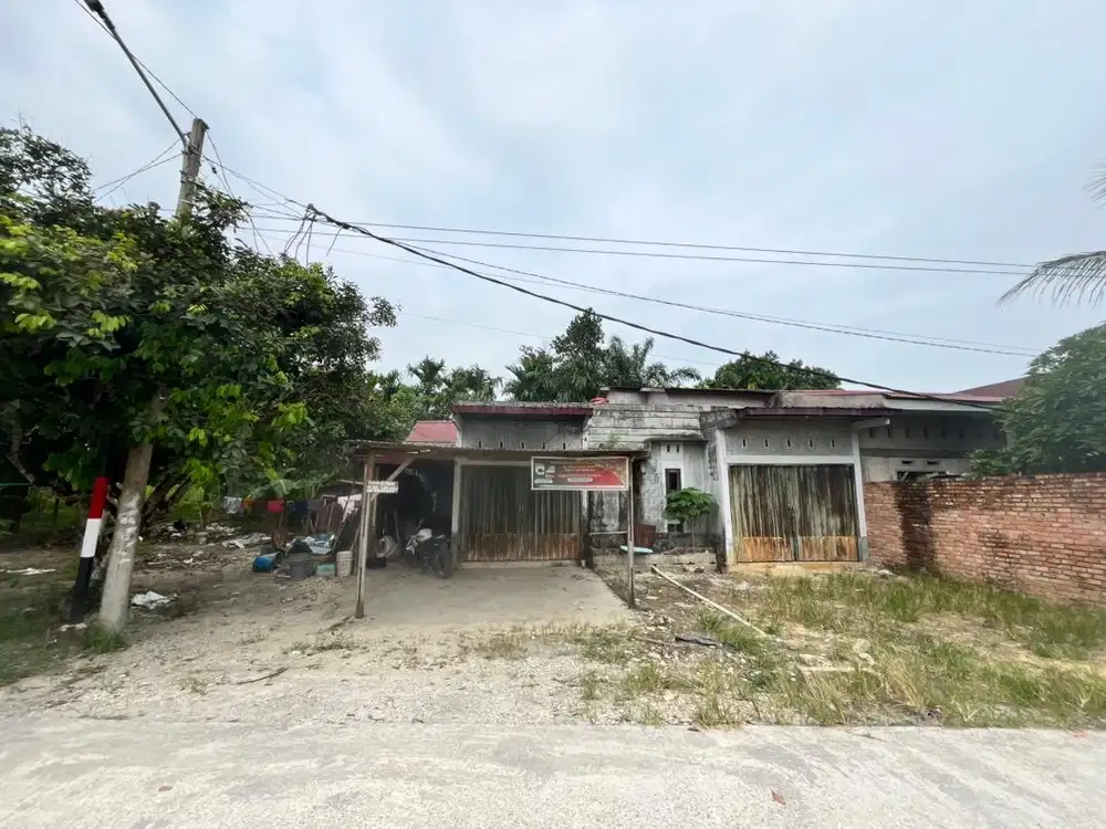 Rumah+ruko lokasi strategis,pigir jalan,lingkungan ramai