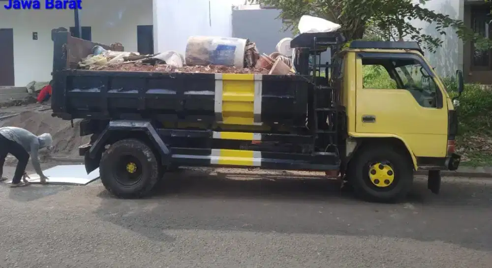 Jasa truk buang puing sewa truk buang puing