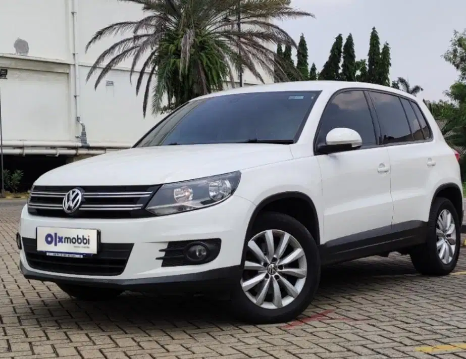 TDP 6,JT Volkswagen Tiguan 1.4 Bensin-AT Coklat 2014
