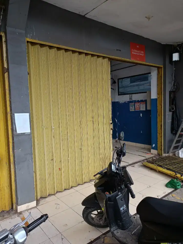 Tukang service rolling door murah