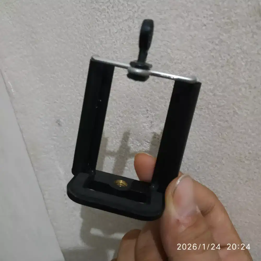 Holder jepitan hp
