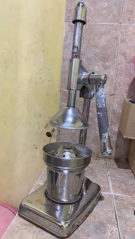 Presan jeruk peras manual