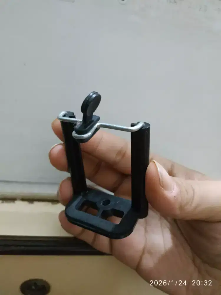 Holder jepitan hp mur plastik