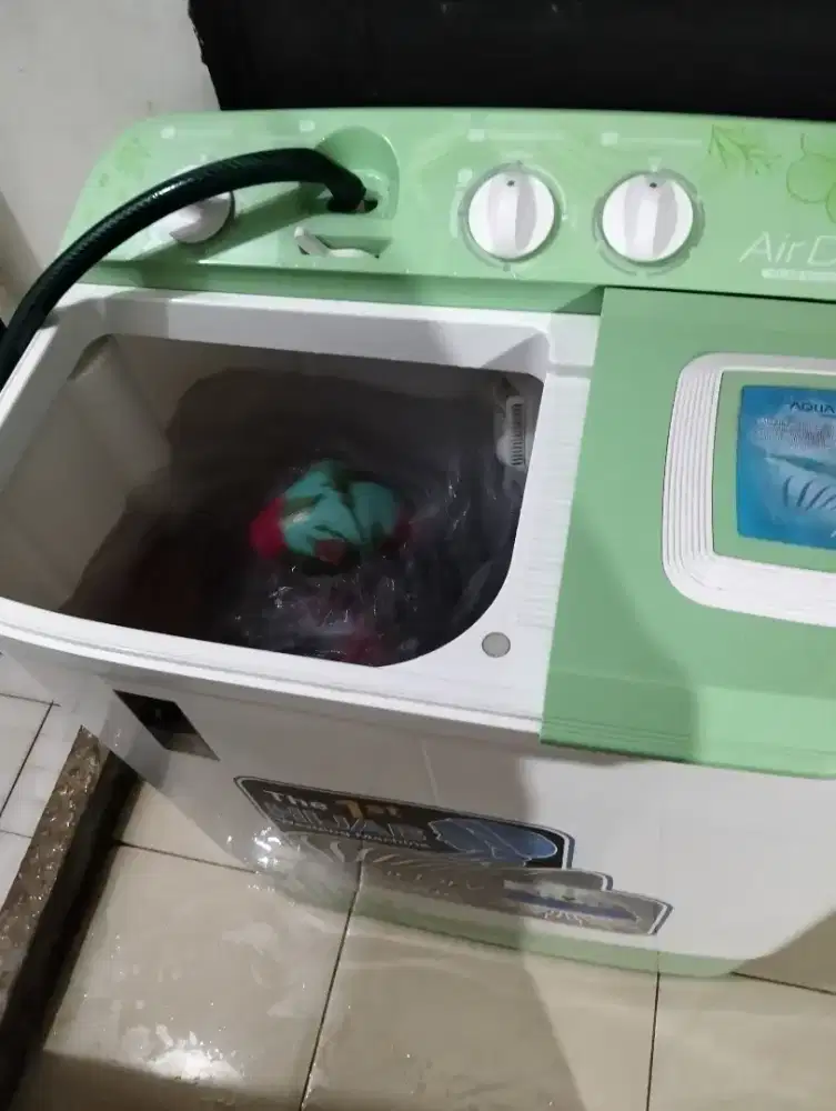 Mesin cuci aqua hijab masih ada garansi