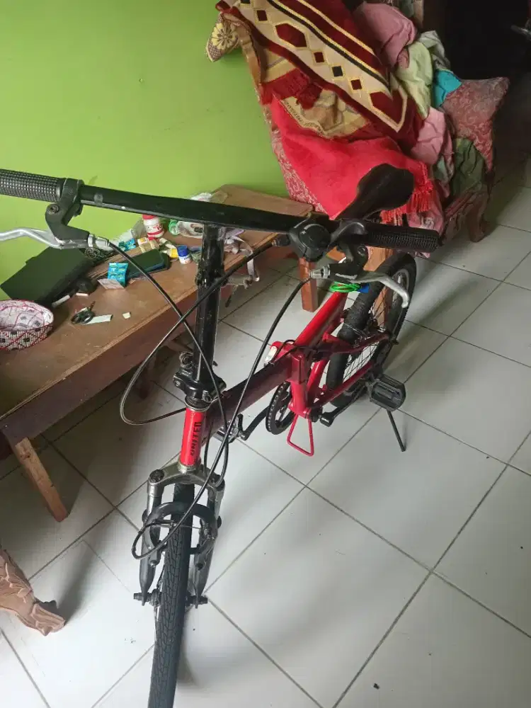 Sepedah lipat united.quest..original..ban masi baru.. hub..08818056673