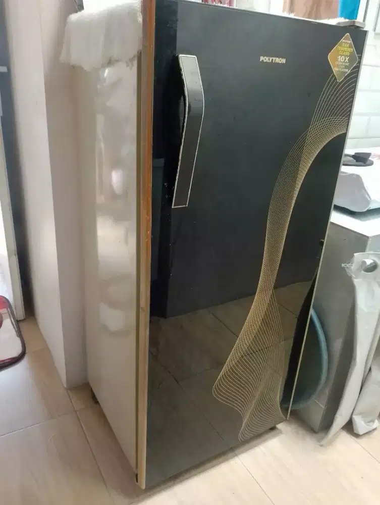 servis berbagai merek kulkas dll