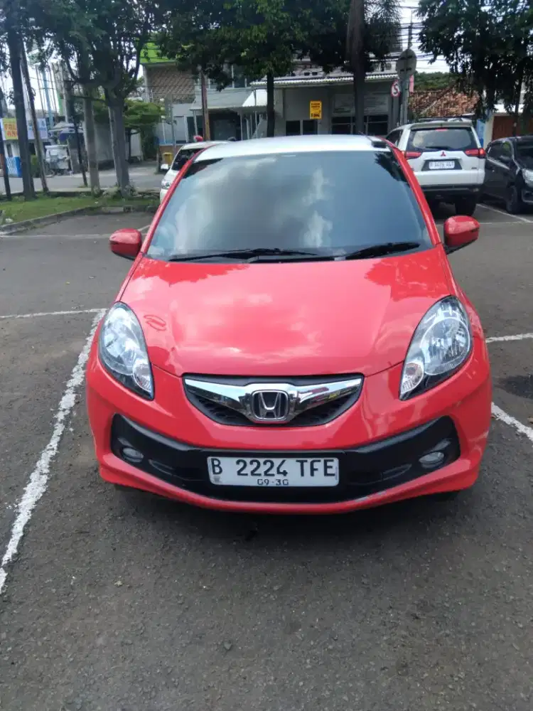 Brio 2015 E a/t  new low kilometer pemakaian pribadi bekas cewek