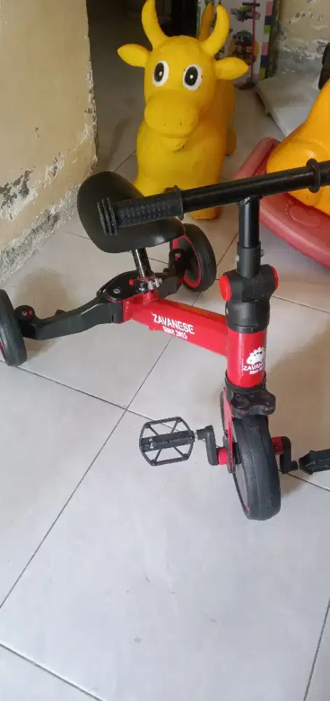 Mainan anak sepeda kuda sapi