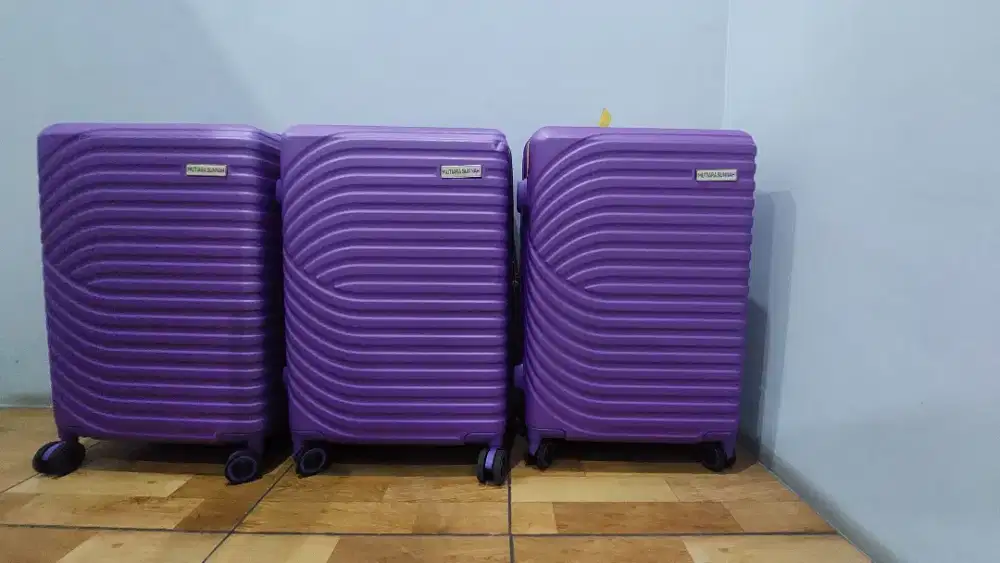 Dijual tas bagasi warna ungu di Jatiwaringin JAKTIM