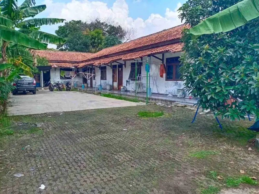 DIJUAL TANAH LUAS 500 m2 DENGAN KONTRAKAN 7 PINTU