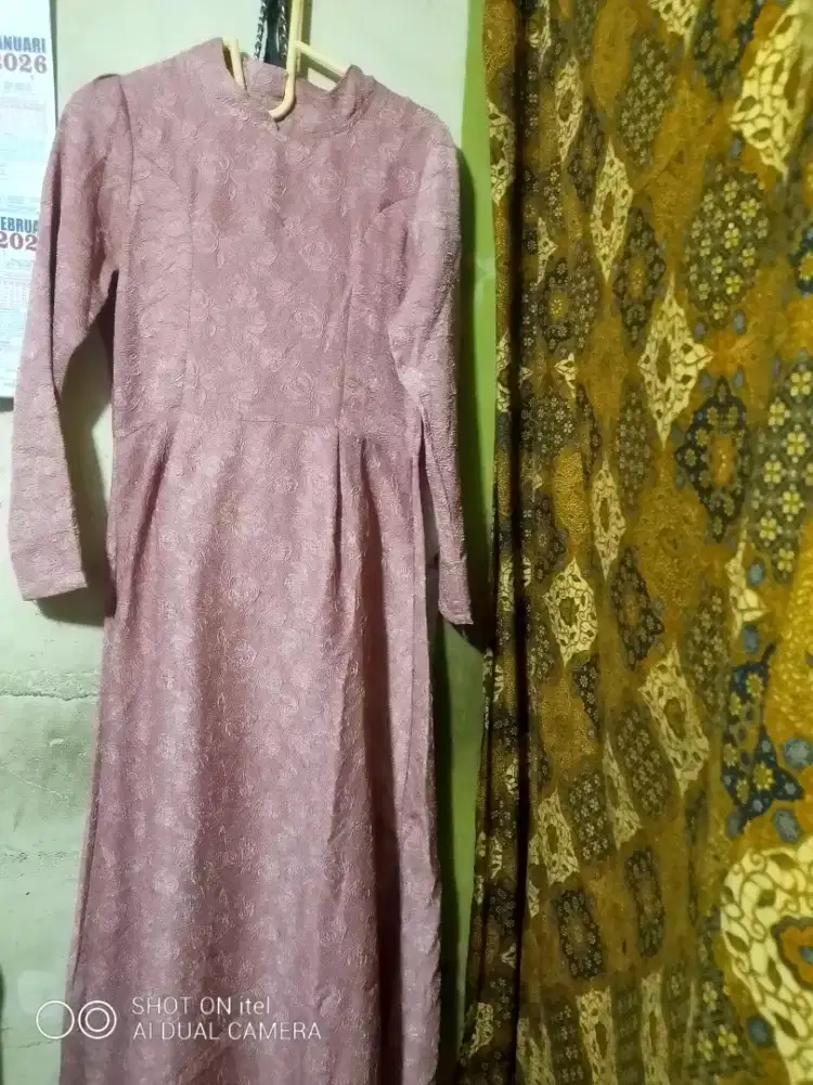 Baju muslim masih baru