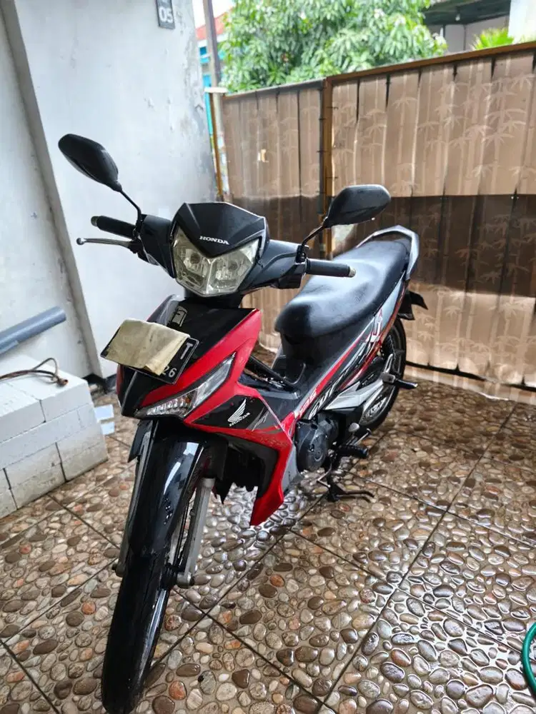 SUPRA X 125 PGM FI 2016 Hitam Merah