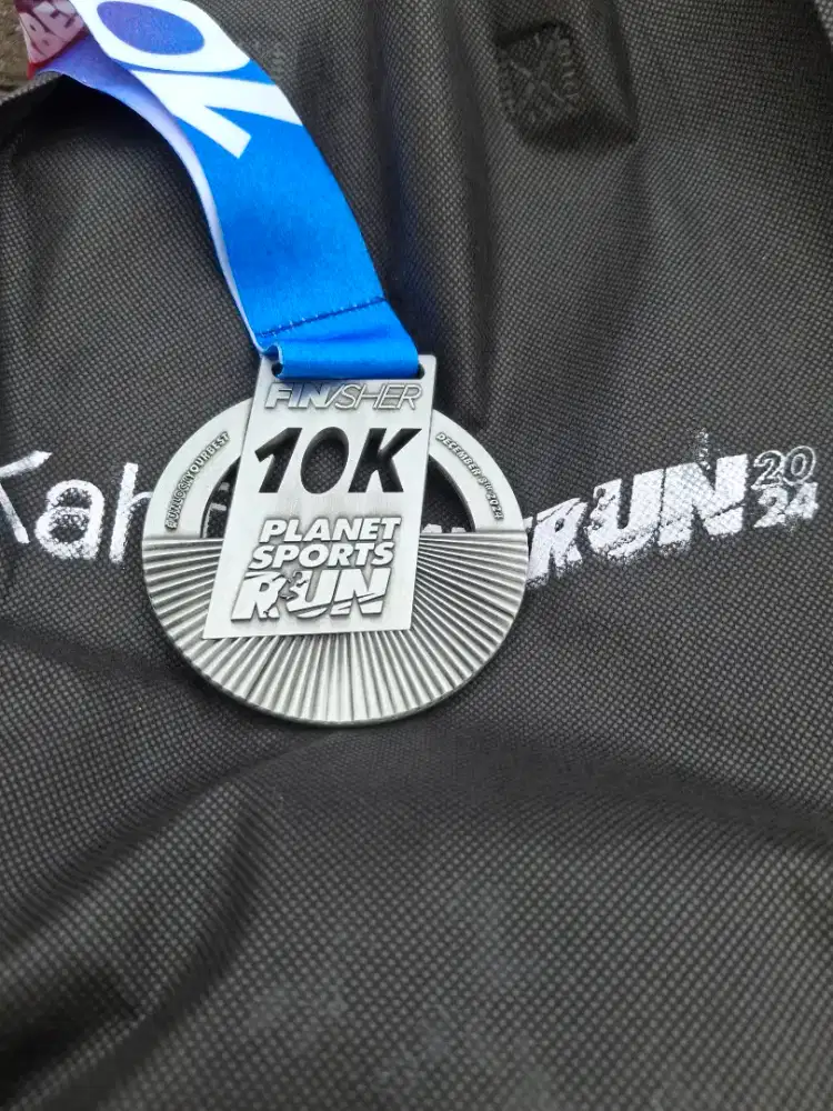 Running medals Planet Sports Run