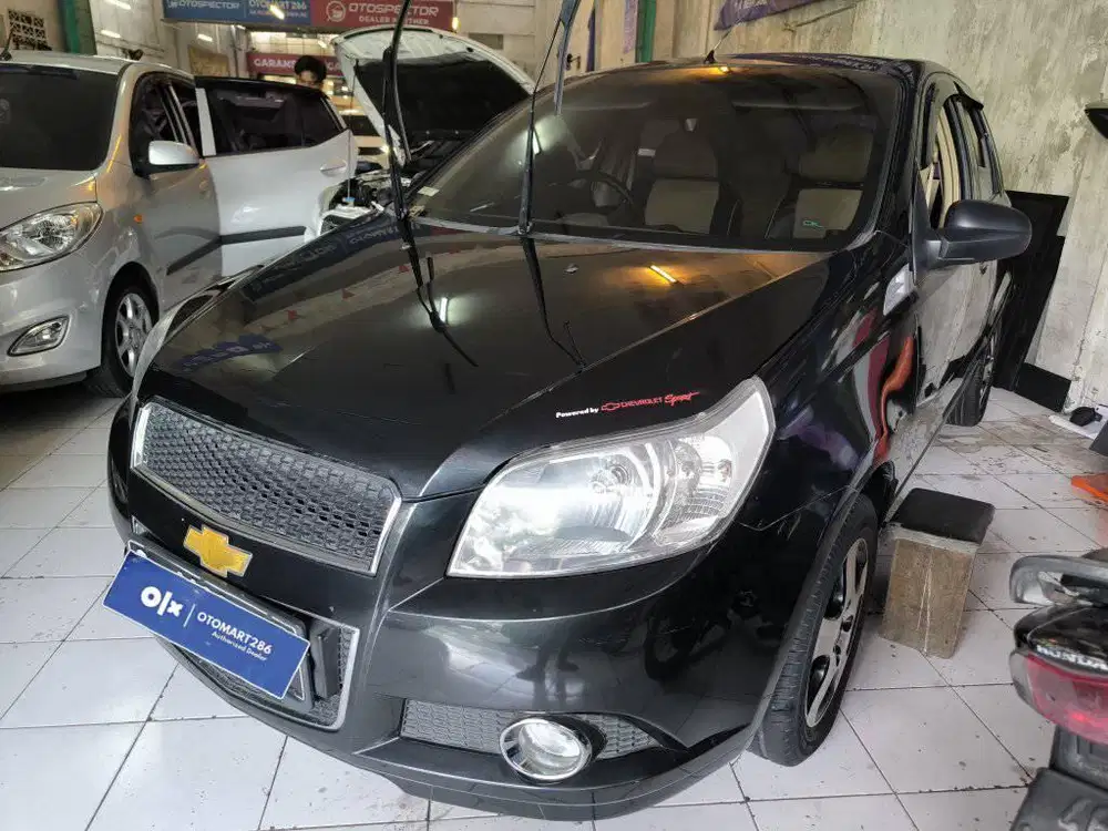 CHEVROLET 2009 AVEO 1.5 MT HITAM MURAH OTOMART 286 KENJERAN