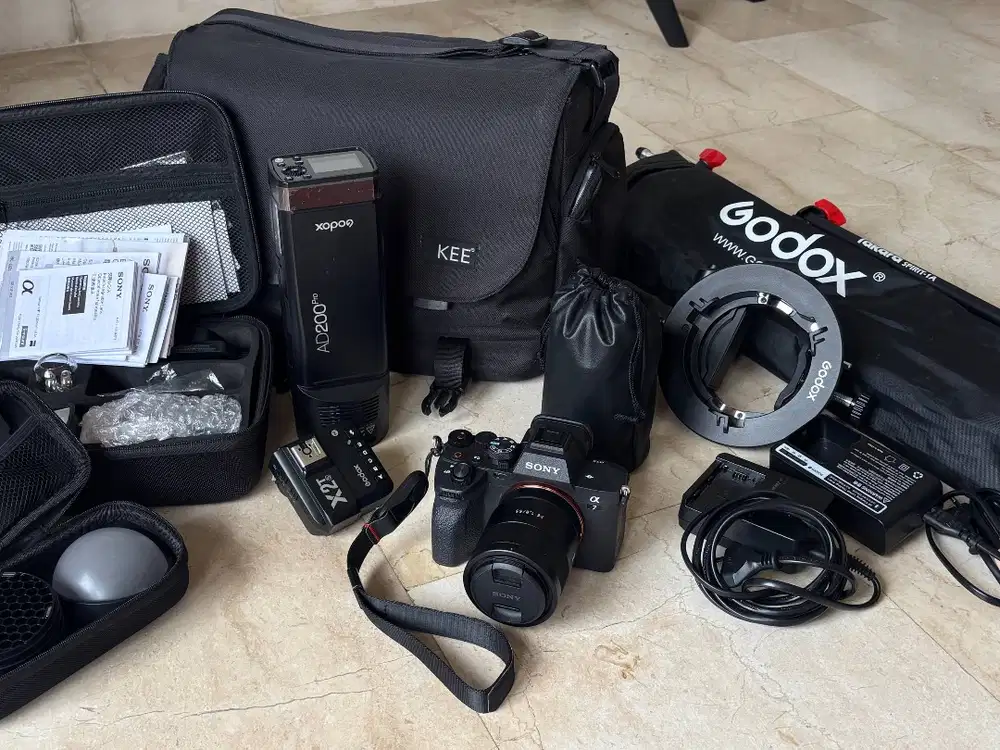 Sony a7iv + Sony FE 55mm f/1.8 + Godox ad200Pro + Accessories