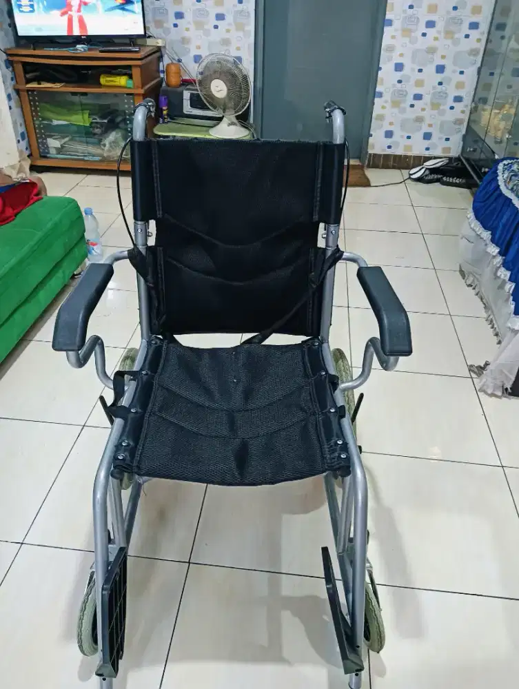 Kursi roda travel premium