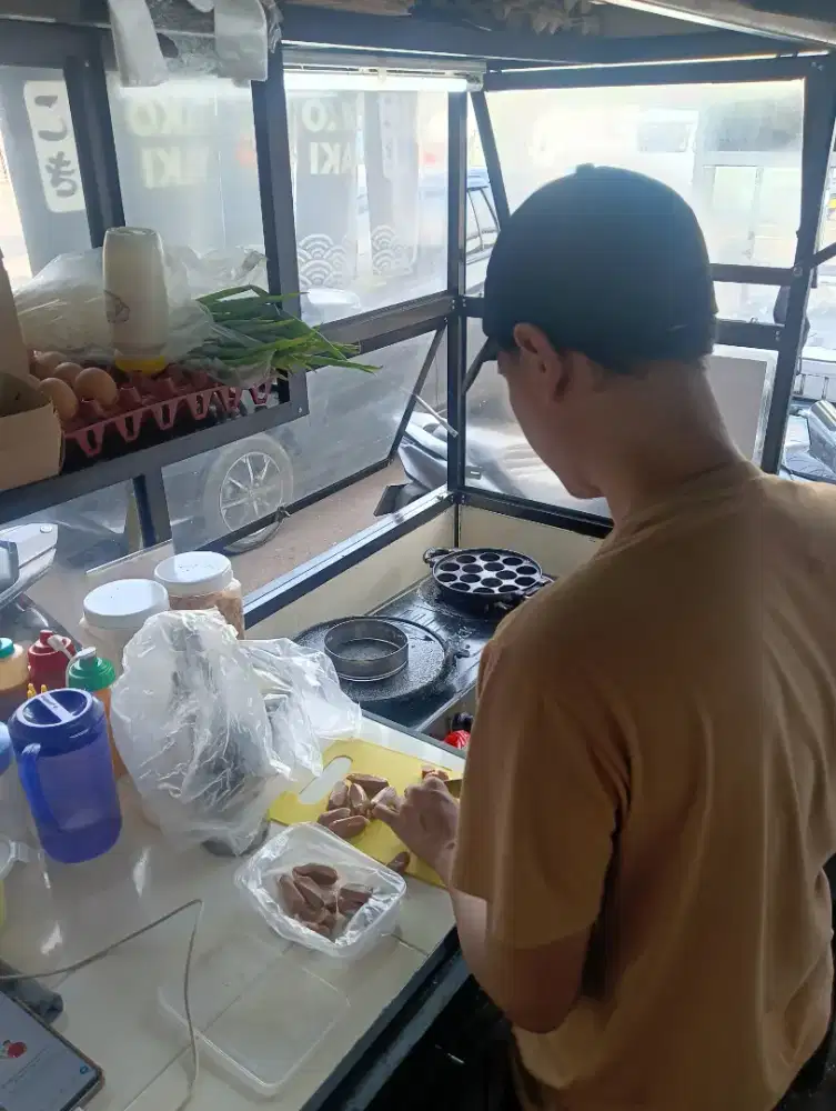 Operator Masak penjualan Takoyaki