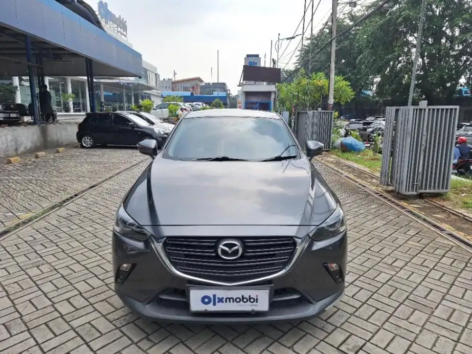 DP RINGAN Mazda CX-3 1.5 Sport Bensin-AT 2021 Abu CWIDB