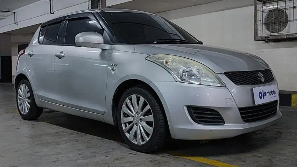 TDP 4,JT Suzuki Swift 1.5 St Bensin-MT Abu 2009