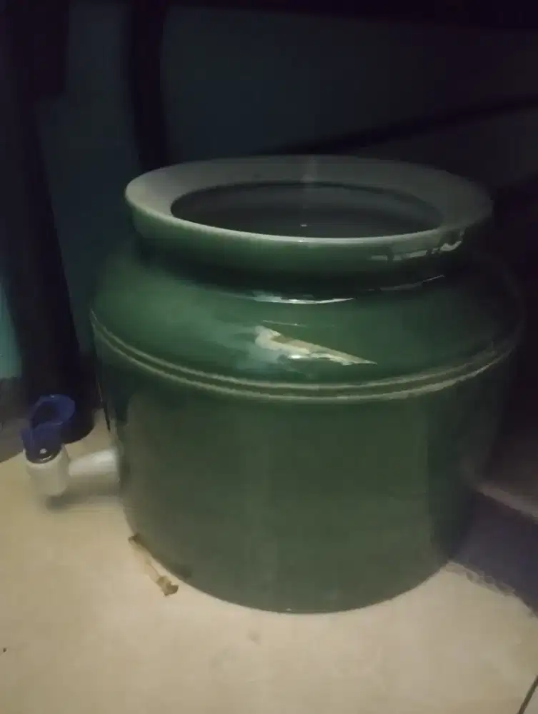 Guci air minum untuk galon