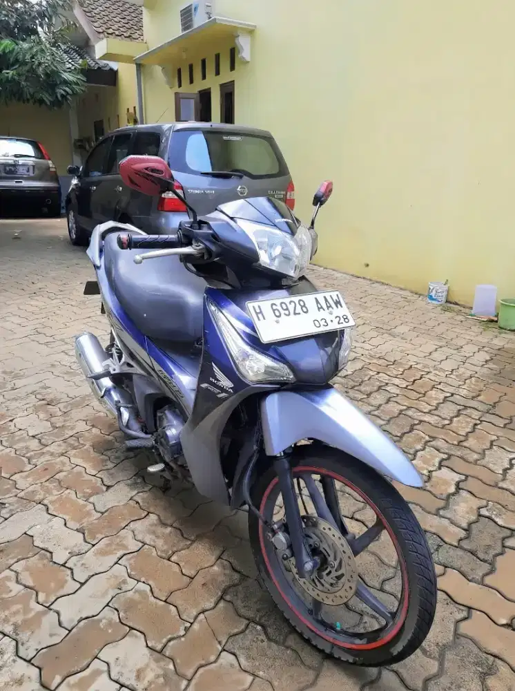 Honda Supra 125 Helm-In Injection