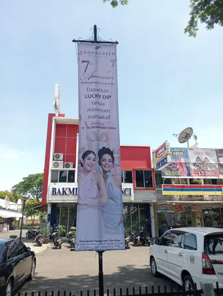 Tempat cetak banner mmt umbul umbul flexi bendera kain sticker promosi