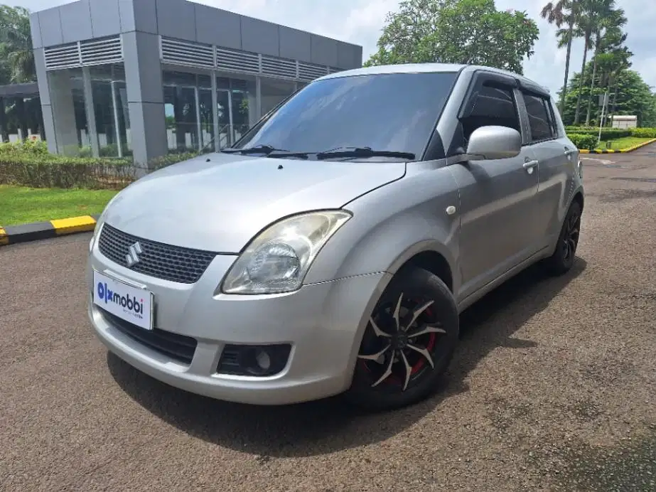 Suzuki Swift 1.5 St Bensin-MT 2009 Abu-Abu