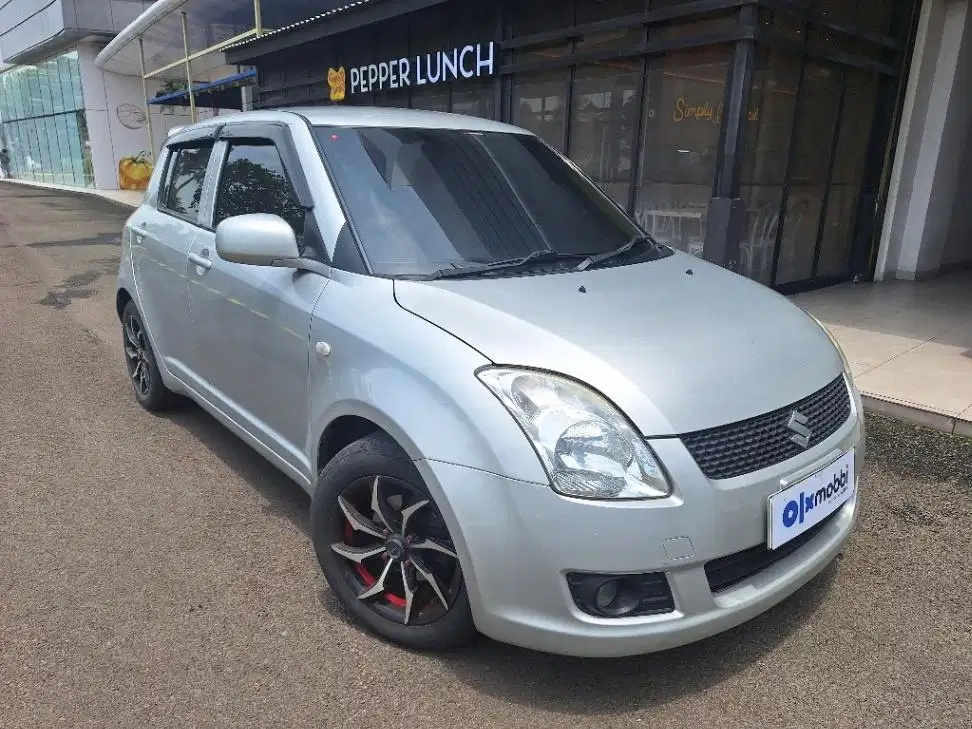 Suzuki Swift 1.5 St Bensin-MT 2009 Abu-Abu