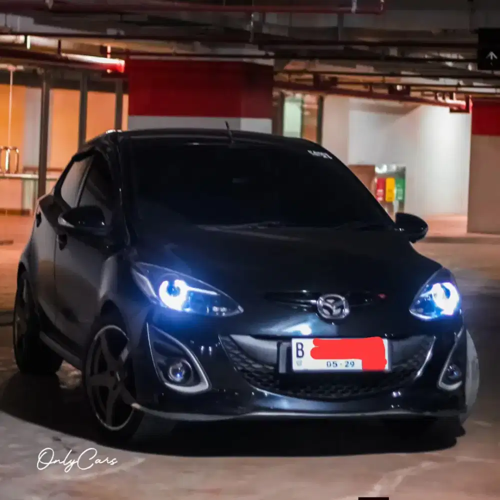 Carter mobil Mazda 2 RZ