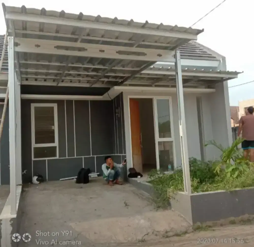 Pasang kanopi baja ringan atap spandek