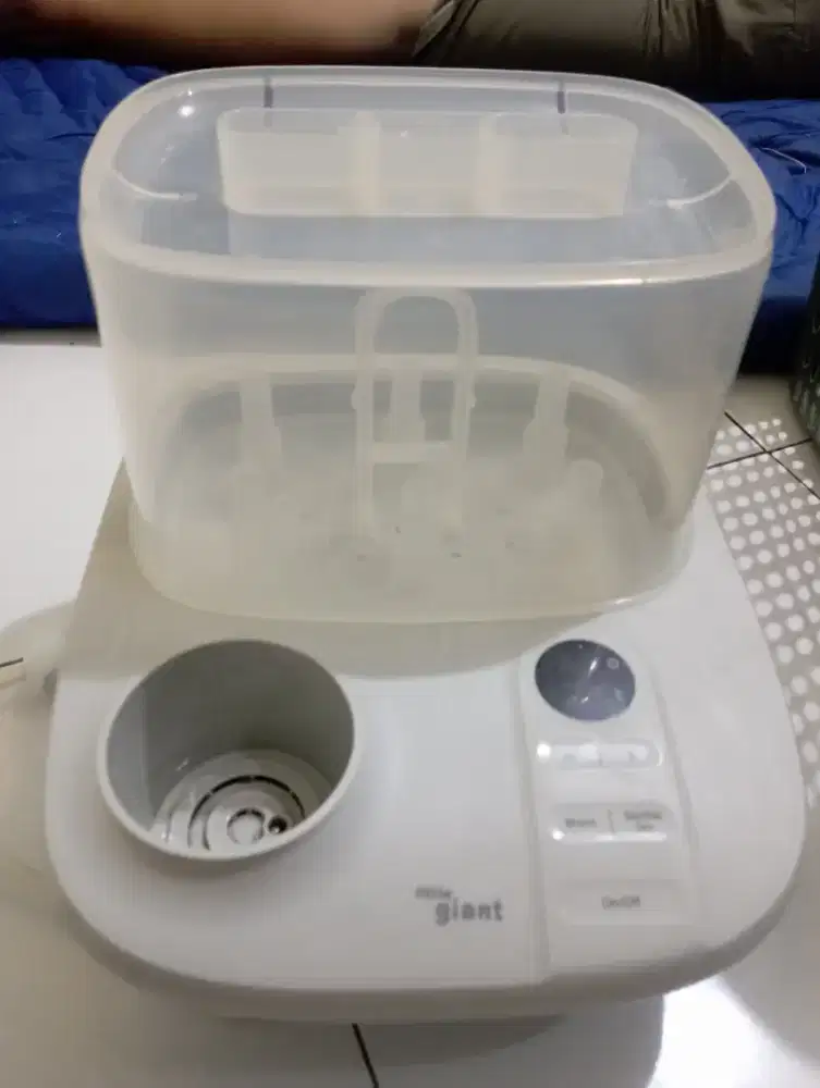 Sterilzer  dryer dan pemanas susu ORI little Giant