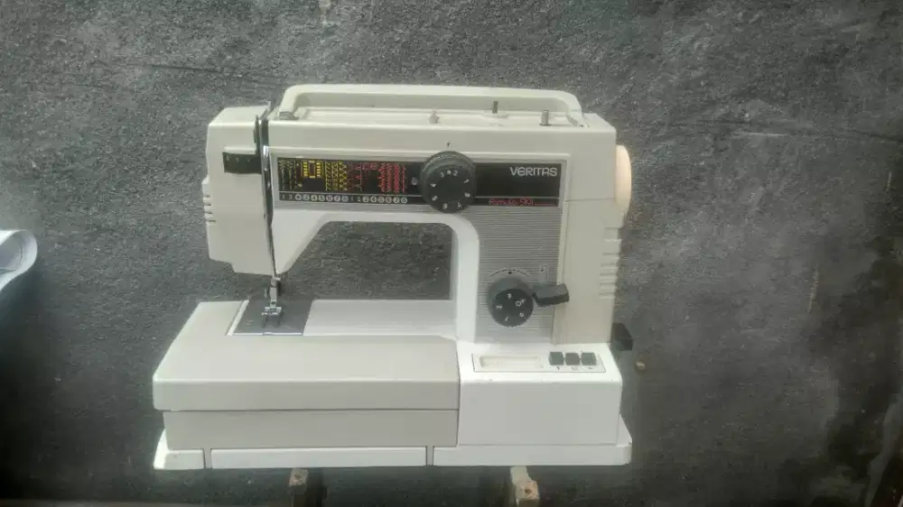 mesin jahit lubang kancing