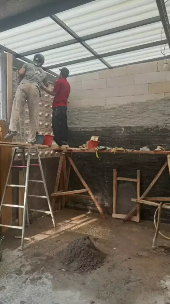 Tukang bangunan ahli