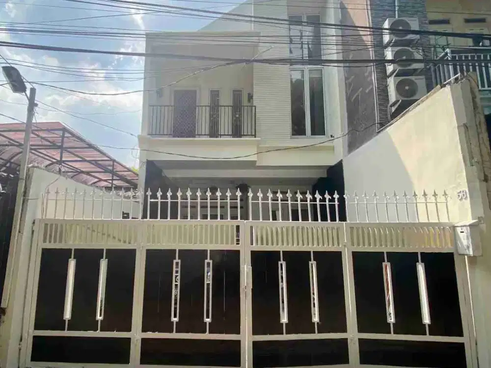 RUMAH MEWAH  DIJUAL DI KEMANG TIMUR MURAH DEKAT JALAN RAYA