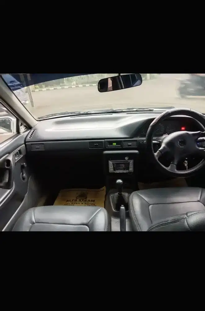 Mazda 323 1999 Bensin