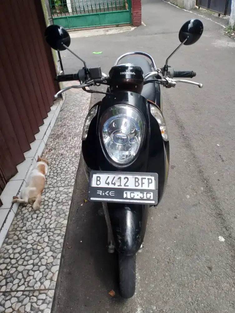 Scoopy fi starter halus idling stop