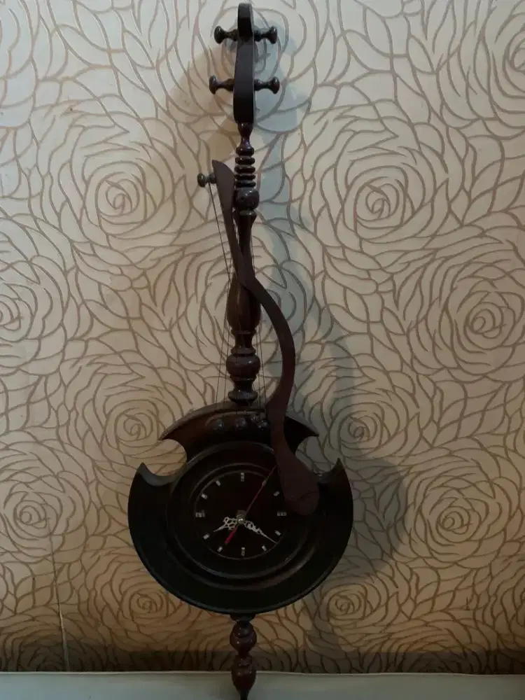 Jam dinding kayu jati