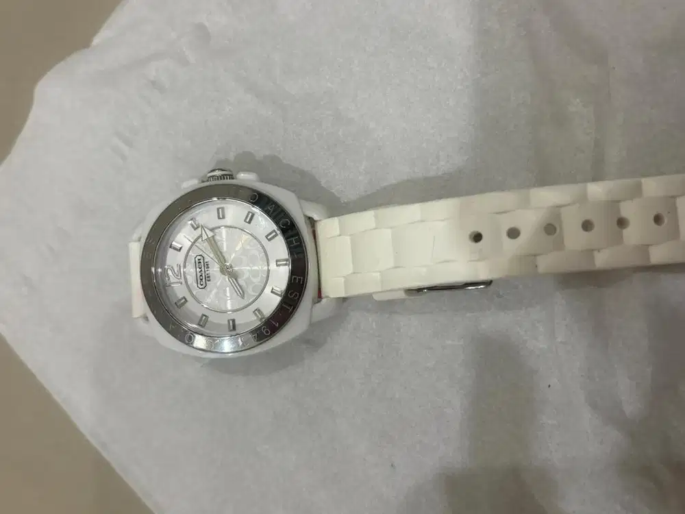 Preloved jam Coach rubber white
