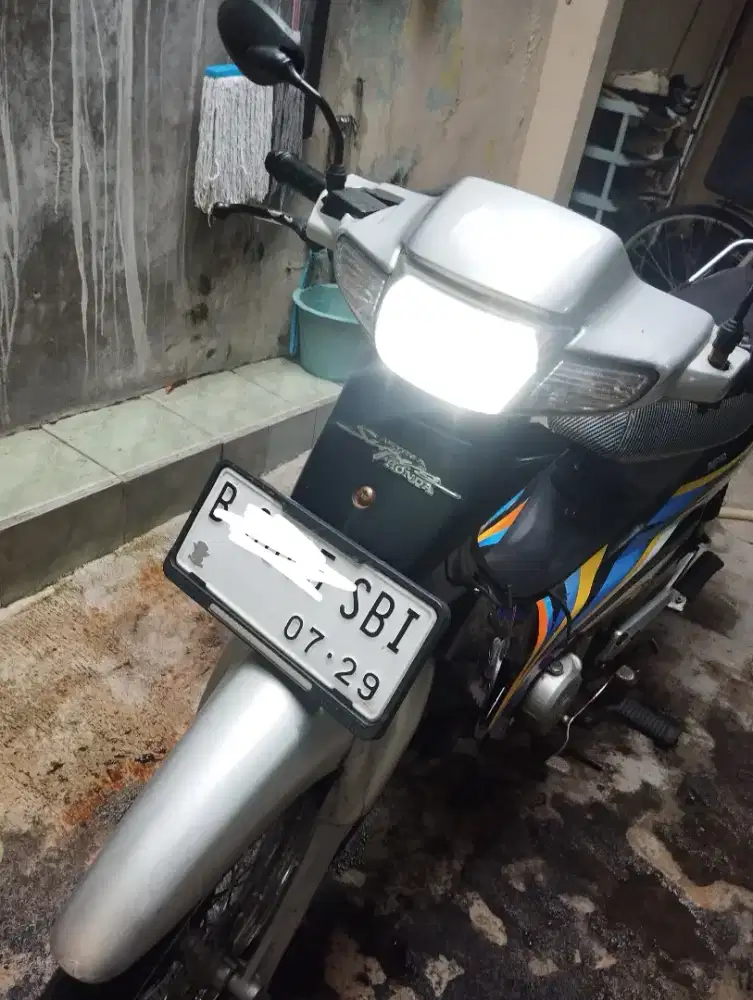 Supra x 100 Tahun 2004