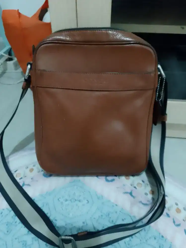 Tas coach sling pria Prelove
