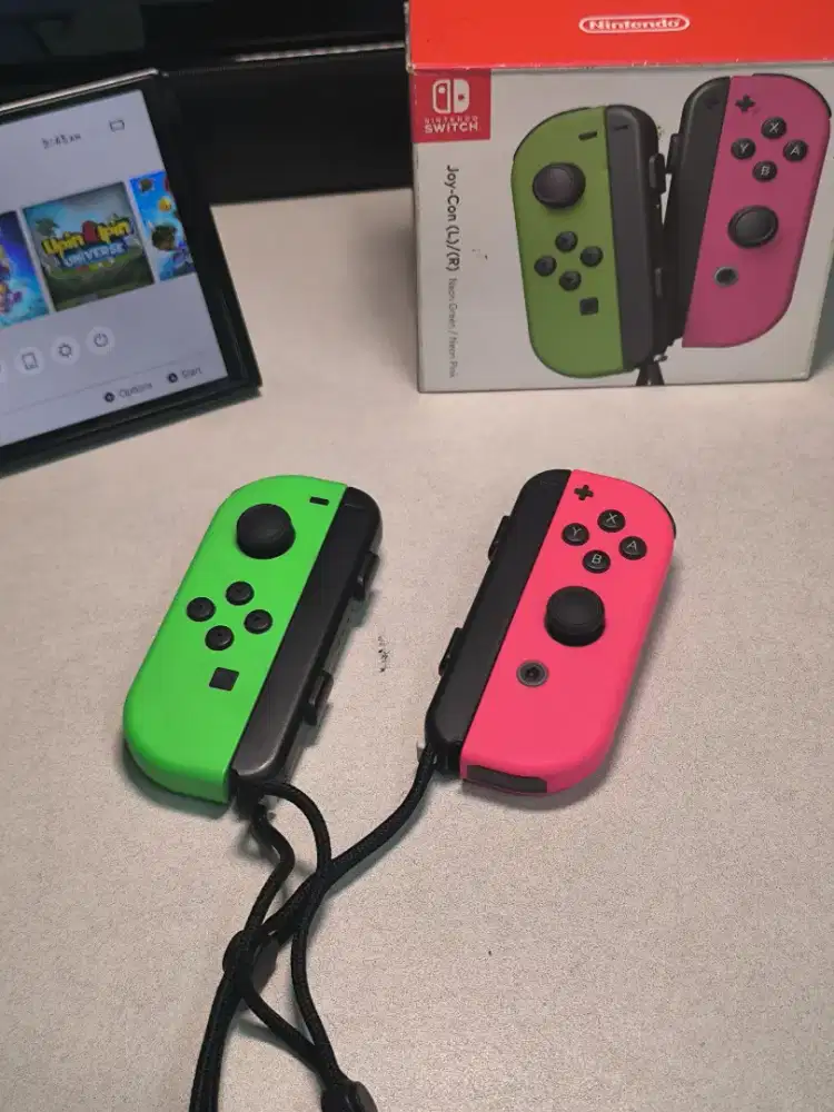 Joycon Switch Neon Green - Pink ORI

Sepasang strap
Analog