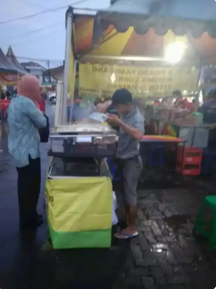 Penjaga stand dimsun